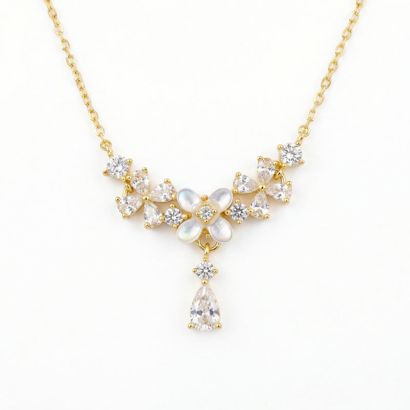 925 Sterling Silver Elegant Mother of Pearl Floral Necklace with Sparkling Pear-Cut Gemstone Accents